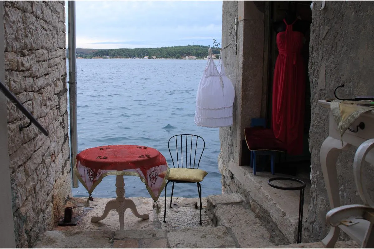 Romantic table and chear near sea in Rovinj